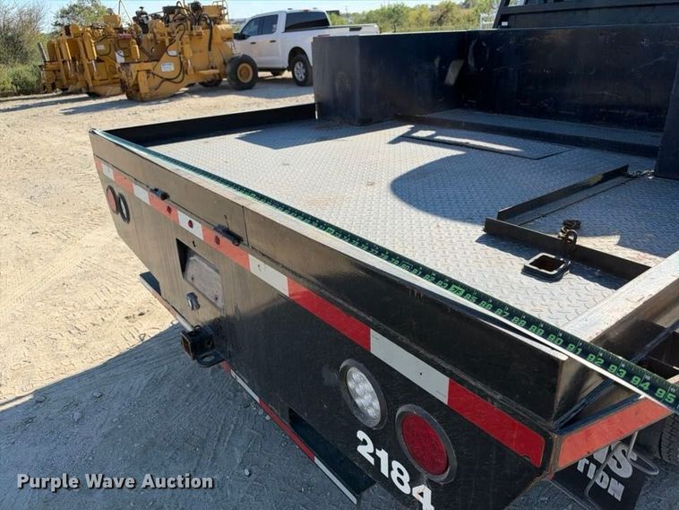 image for item FN3749 2021 GMC Sierra 3500HD 4X4 Crew Cab flatbed pickup truck