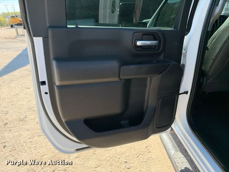 image for item FN3749 2021 GMC Sierra 3500HD 4X4 Crew Cab flatbed pickup truck