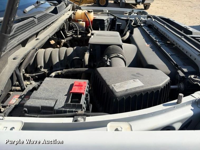 image for item FN3749 2021 GMC Sierra 3500HD 4X4 Crew Cab flatbed pickup truck