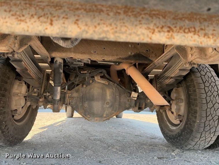 image for item FN3749 2021 GMC Sierra 3500HD 4X4 Crew Cab flatbed pickup truck