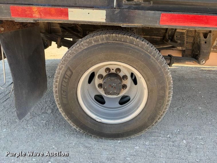 image for item FN3749 2021 GMC Sierra 3500HD 4X4 Crew Cab flatbed pickup truck