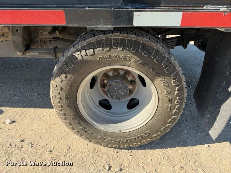 image for item FN3749 2021 GMC Sierra 3500HD 4X4 Crew Cab flatbed pickup truck