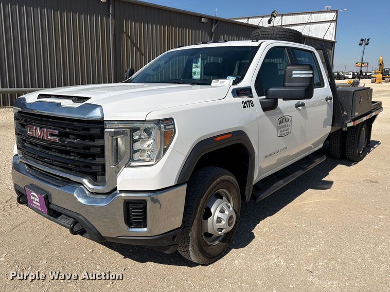image for item FN3750 2021 GMC Sierra 3500HD 4X4 Crew Cab flatbed pickup truck