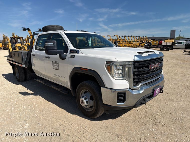 image for item FN3750 2021 GMC Sierra 3500HD 4X4 Crew Cab flatbed pickup truck