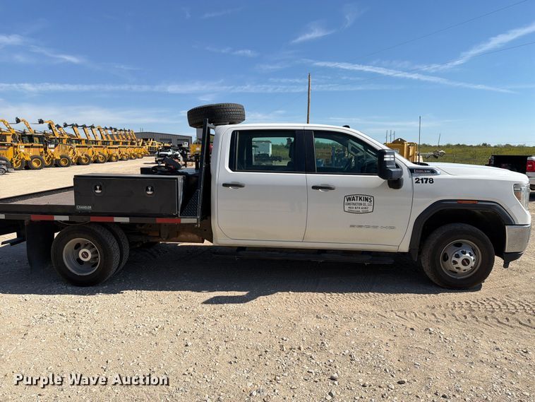 image for item FN3750 2021 GMC Sierra 3500HD 4X4 Crew Cab flatbed pickup truck