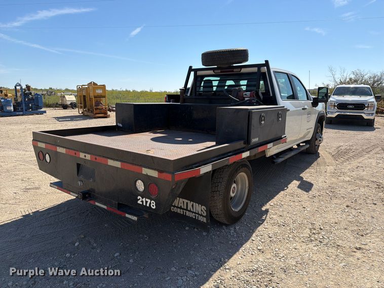 image for item FN3750 2021 GMC Sierra 3500HD 4X4 Crew Cab flatbed pickup truck
