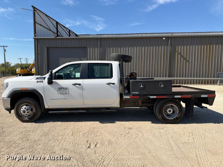 image for item FN3750 2021 GMC Sierra 3500HD 4X4 Crew Cab flatbed pickup truck
