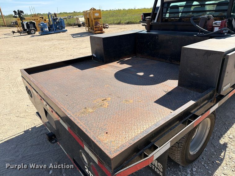 image for item FN3750 2021 GMC Sierra 3500HD 4X4 Crew Cab flatbed pickup truck
