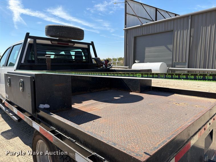 image for item FN3750 2021 GMC Sierra 3500HD 4X4 Crew Cab flatbed pickup truck