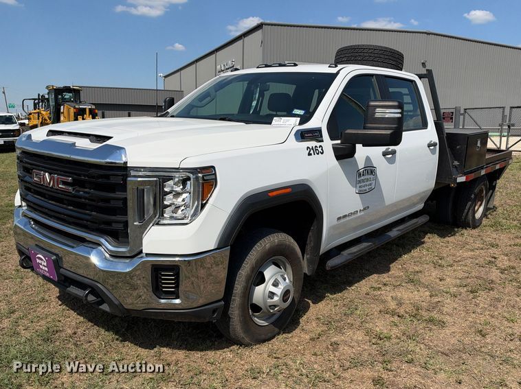 image for item FN3751 2021 GMC Sierra 3500 4X4 Crew Cab flatbed pickup truck