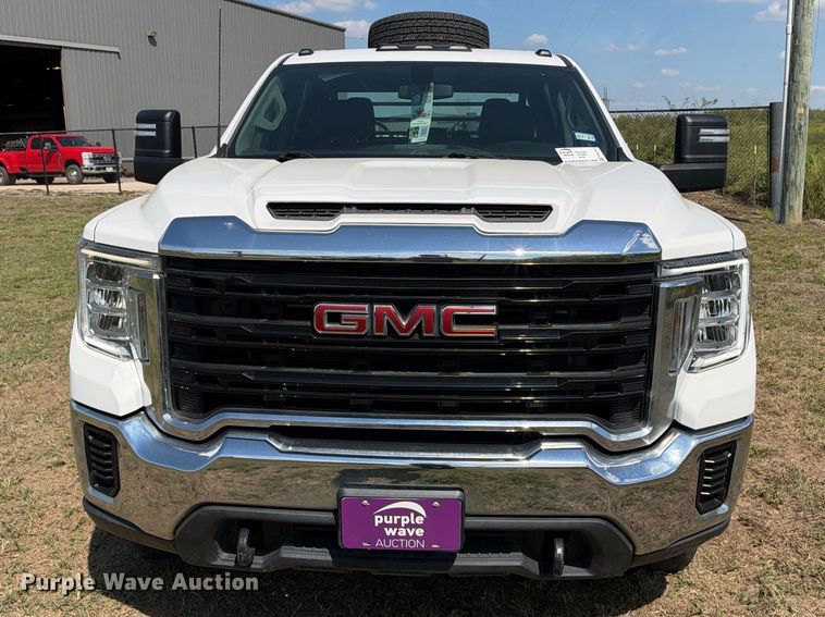 image for item FN3751 2021 GMC Sierra 3500 4X4 Crew Cab flatbed pickup truck