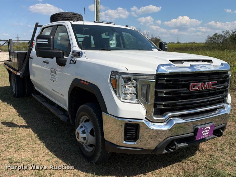 image for item FN3751 2021 GMC Sierra 3500 4X4 Crew Cab flatbed pickup truck