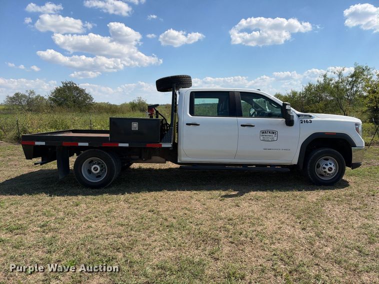 image for item FN3751 2021 GMC Sierra 3500 4X4 Crew Cab flatbed pickup truck