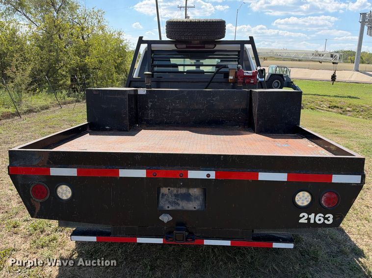 image for item FN3751 2021 GMC Sierra 3500 4X4 Crew Cab flatbed pickup truck