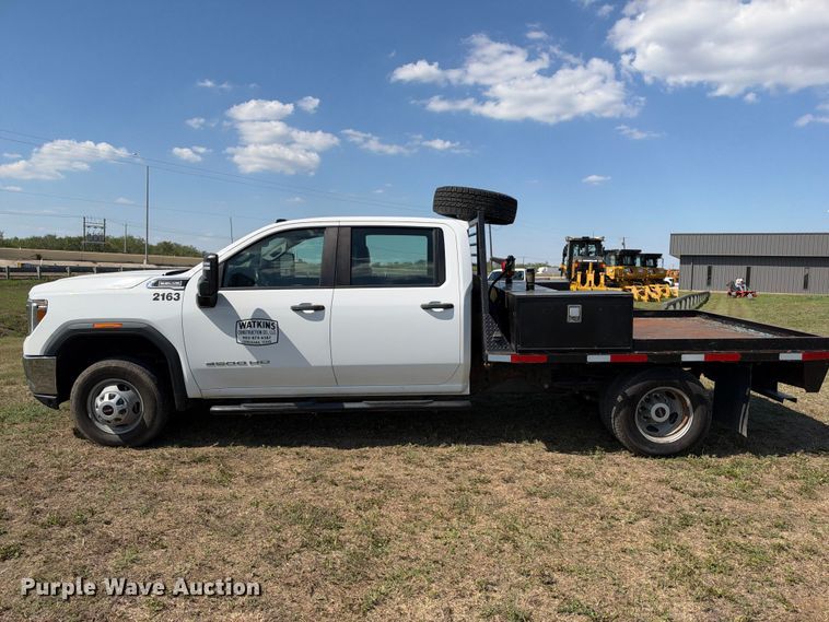 image for item FN3751 2021 GMC Sierra 3500 4X4 Crew Cab flatbed pickup truck