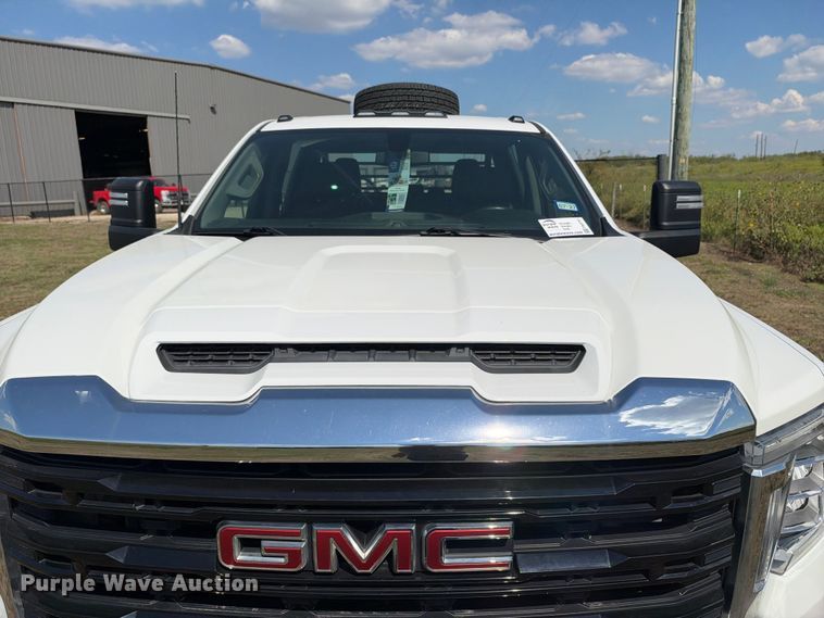 image for item FN3751 2021 GMC Sierra 3500 4X4 Crew Cab flatbed pickup truck