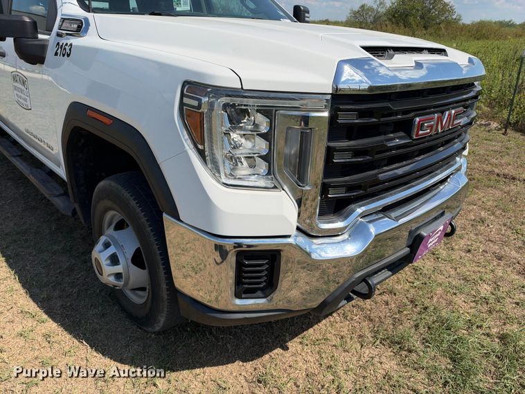 image for item FN3751 2021 GMC Sierra 3500 4X4 Crew Cab flatbed pickup truck