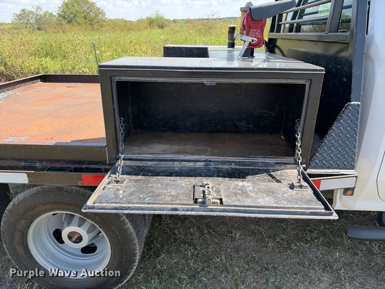 image for item FN3751 2021 GMC Sierra 3500 4X4 Crew Cab flatbed pickup truck
