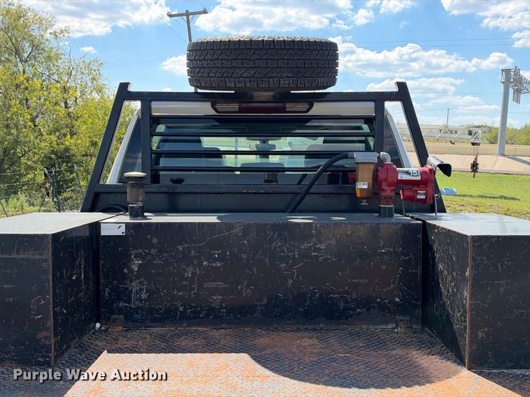 image for item FN3751 2021 GMC Sierra 3500 4X4 Crew Cab flatbed pickup truck