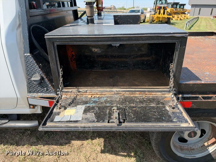image for item FN3751 2021 GMC Sierra 3500 4X4 Crew Cab flatbed pickup truck