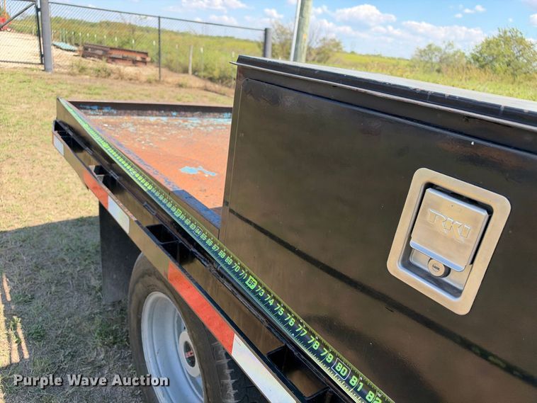 image for item FN3751 2021 GMC Sierra 3500 4X4 Crew Cab flatbed pickup truck