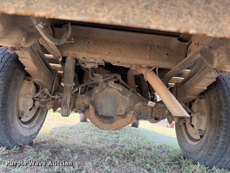 image for item FN3751 2021 GMC Sierra 3500 4X4 Crew Cab flatbed pickup truck