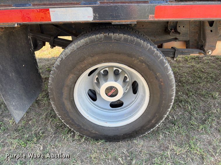 image for item FN3751 2021 GMC Sierra 3500 4X4 Crew Cab flatbed pickup truck