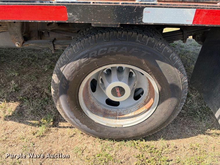 image for item FN3751 2021 GMC Sierra 3500 4X4 Crew Cab flatbed pickup truck