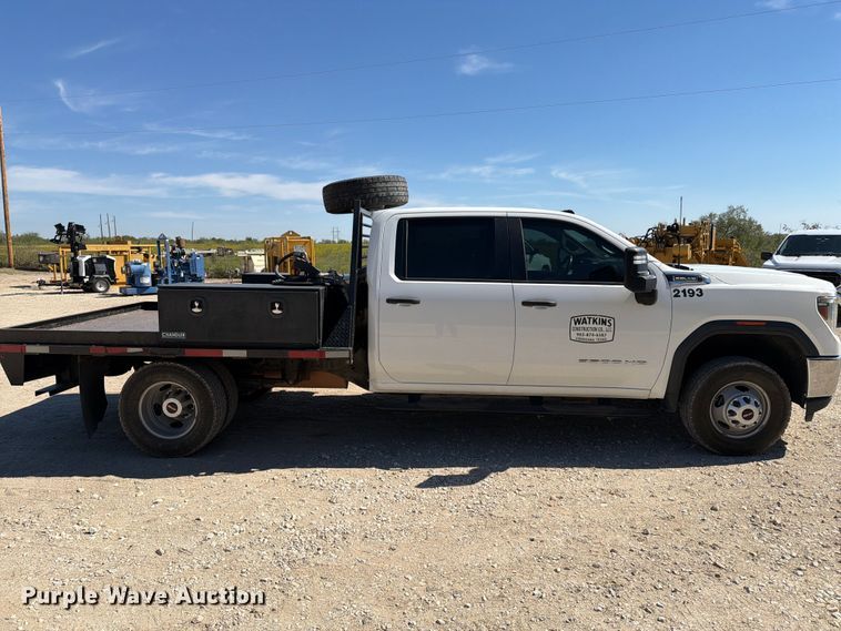 image for item FN3755 2021 GMC Sierra 3500HD 4X4 Crew Cab flatbed pickup truck