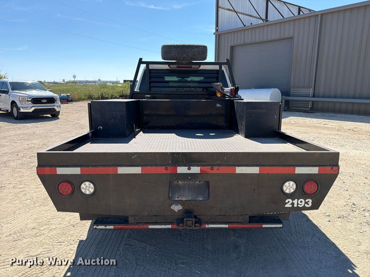 image for item FN3755 2021 GMC Sierra 3500HD 4X4 Crew Cab flatbed pickup truck