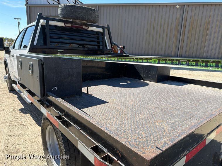 image for item FN3755 2021 GMC Sierra 3500HD 4X4 Crew Cab flatbed pickup truck