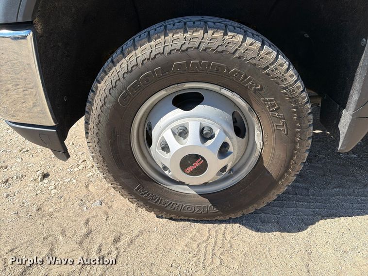 image for item FN3755 2021 GMC Sierra 3500HD 4X4 Crew Cab flatbed pickup truck
