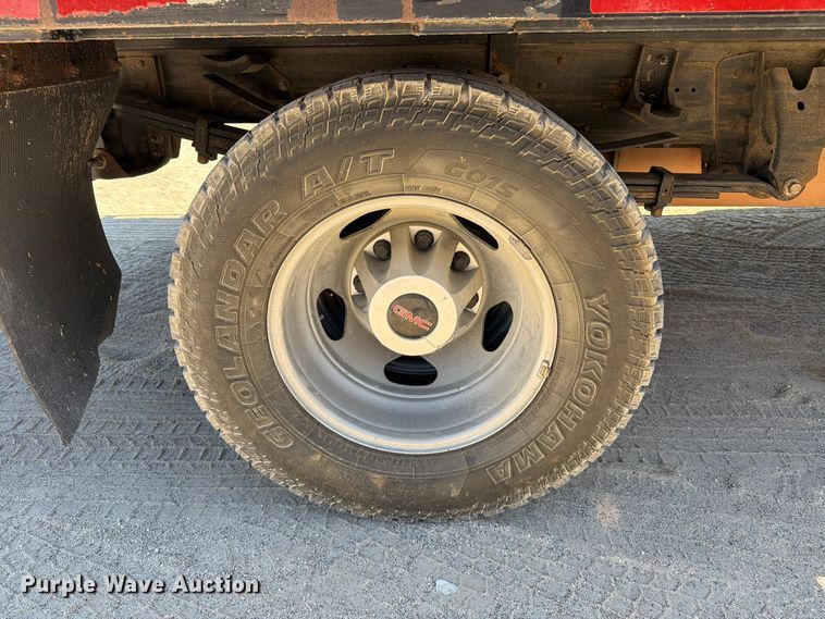 image for item FN3755 2021 GMC Sierra 3500HD 4X4 Crew Cab flatbed pickup truck