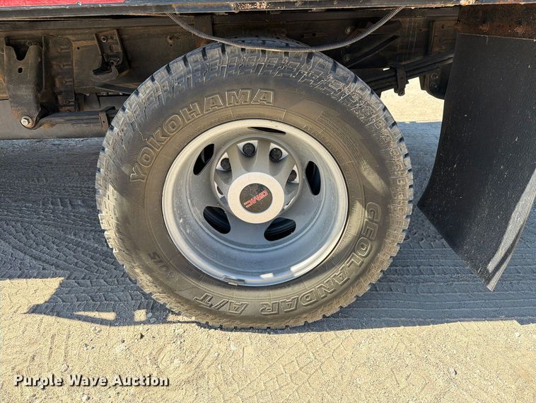 image for item FN3755 2021 GMC Sierra 3500HD 4X4 Crew Cab flatbed pickup truck