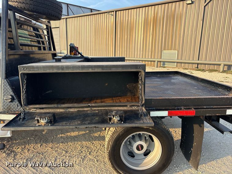 image for item FN3756 2021 GMC Sierra 3500 Crew Cab flatbed pickup truck