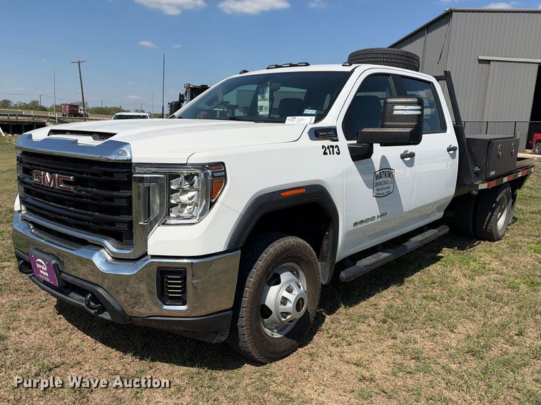 image for item FN3757 2021 GMC Sierra 3500 4X4 Crew Cab flatbed pickup truck