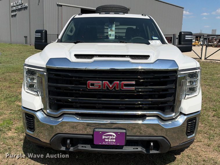 image for item FN3757 2021 GMC Sierra 3500 4X4 Crew Cab flatbed pickup truck