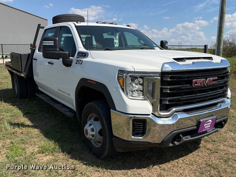 image for item FN3757 2021 GMC Sierra 3500 4X4 Crew Cab flatbed pickup truck