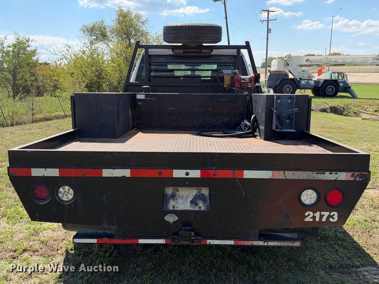 image for item FN3757 2021 GMC Sierra 3500 4X4 Crew Cab flatbed pickup truck