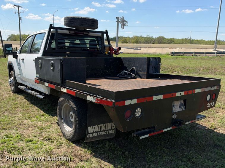 image for item FN3757 2021 GMC Sierra 3500 4X4 Crew Cab flatbed pickup truck