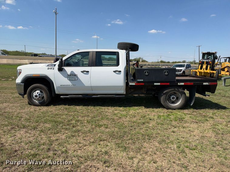 image for item FN3757 2021 GMC Sierra 3500 4X4 Crew Cab flatbed pickup truck