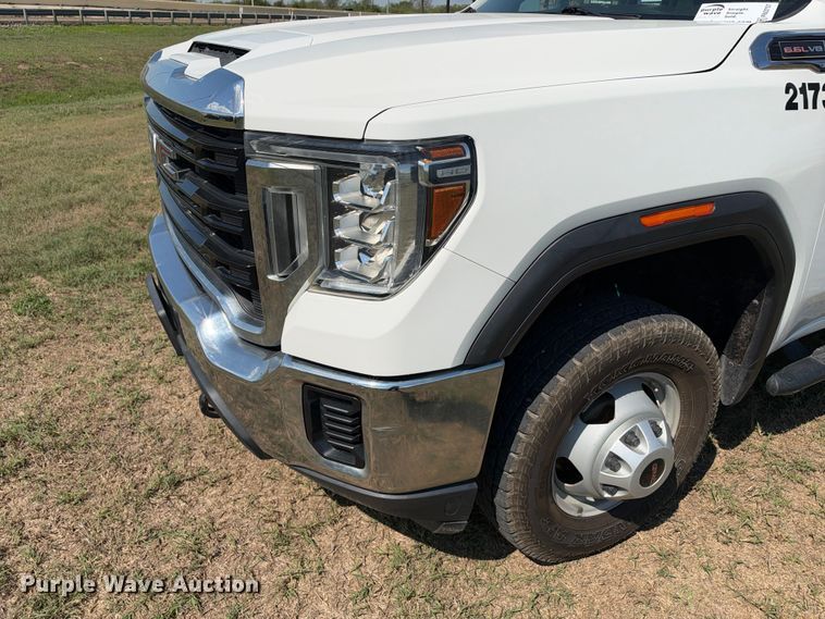 image for item FN3757 2021 GMC Sierra 3500 4X4 Crew Cab flatbed pickup truck