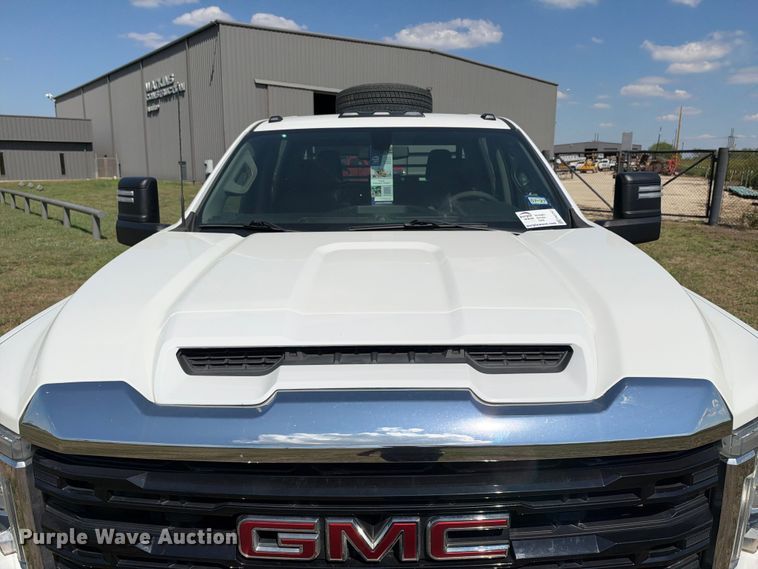 image for item FN3757 2021 GMC Sierra 3500 4X4 Crew Cab flatbed pickup truck