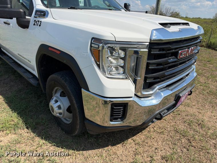 image for item FN3757 2021 GMC Sierra 3500 4X4 Crew Cab flatbed pickup truck