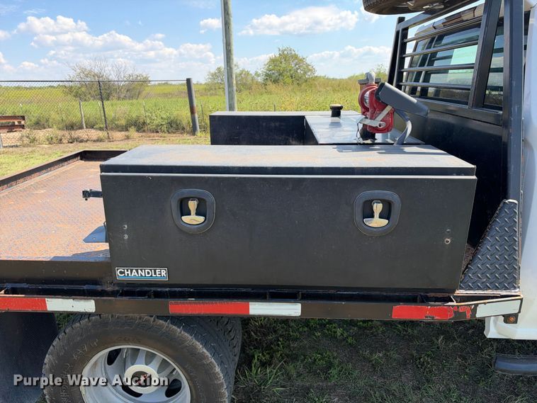 image for item FN3757 2021 GMC Sierra 3500 4X4 Crew Cab flatbed pickup truck