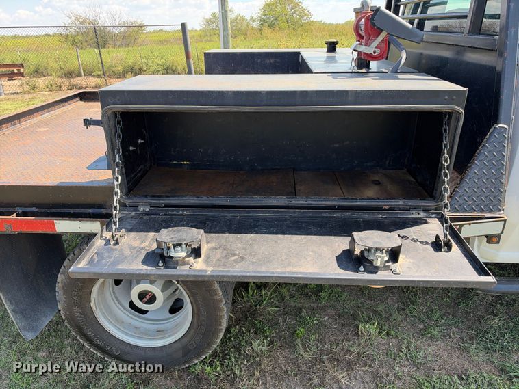 image for item FN3757 2021 GMC Sierra 3500 4X4 Crew Cab flatbed pickup truck