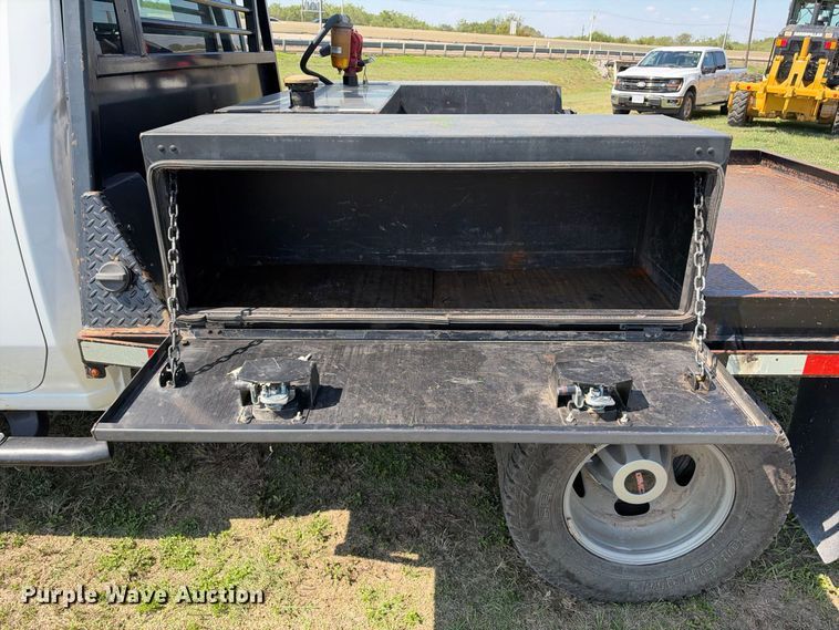 image for item FN3757 2021 GMC Sierra 3500 4X4 Crew Cab flatbed pickup truck