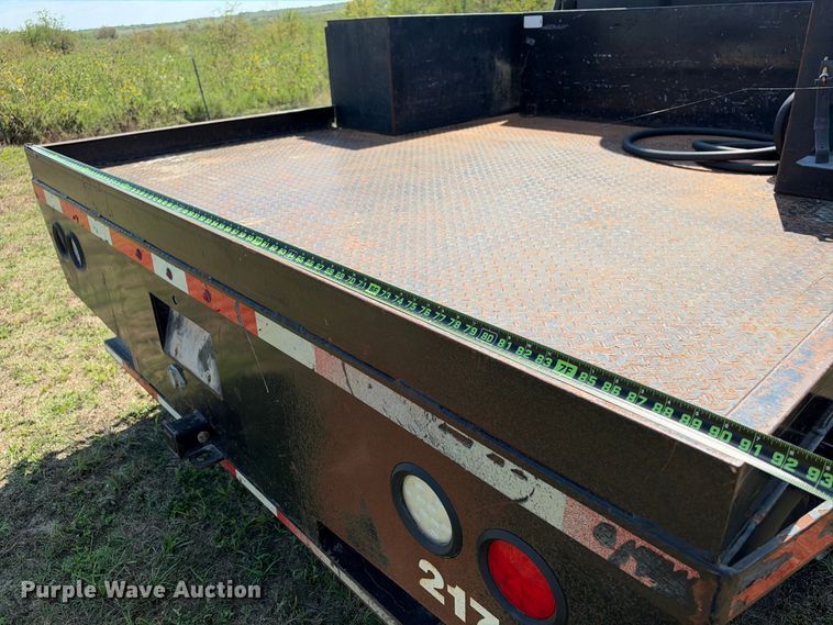 image for item FN3757 2021 GMC Sierra 3500 4X4 Crew Cab flatbed pickup truck