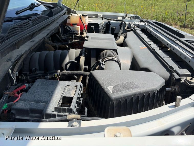 image for item FN3757 2021 GMC Sierra 3500 4X4 Crew Cab flatbed pickup truck