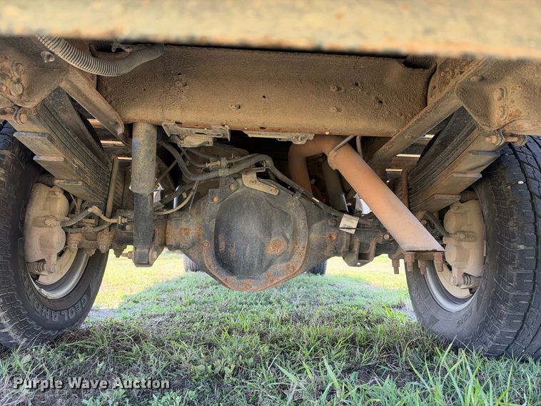 image for item FN3757 2021 GMC Sierra 3500 4X4 Crew Cab flatbed pickup truck